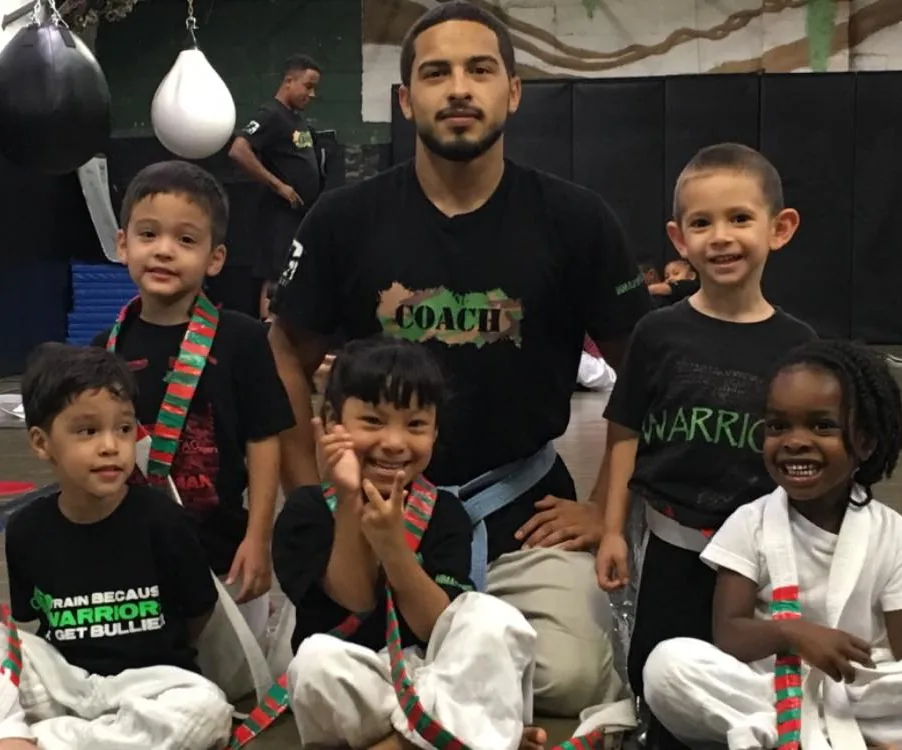 Coach Steve with kids at Jungle Gym Martial Arts
